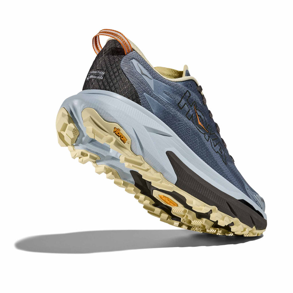 Lateral - and outsole - view of the right shoe from a pair of HOKA Men's Mafate 5 Running Shoes in the Mineral Blue/Washed Blue colourway.