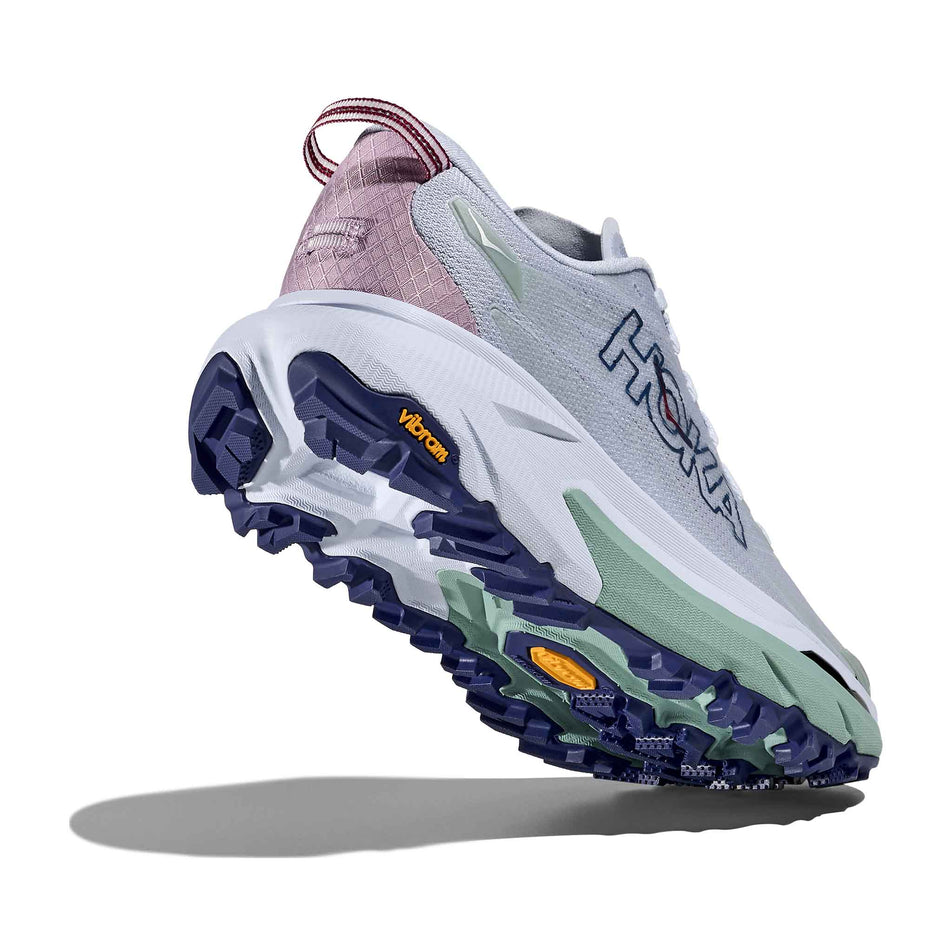 Lateral - and outsole - view of the right shoe from a pair of HOKA Women's Mafate 5 Running Shoes in the Ambient Blue/Rosemary colourway.