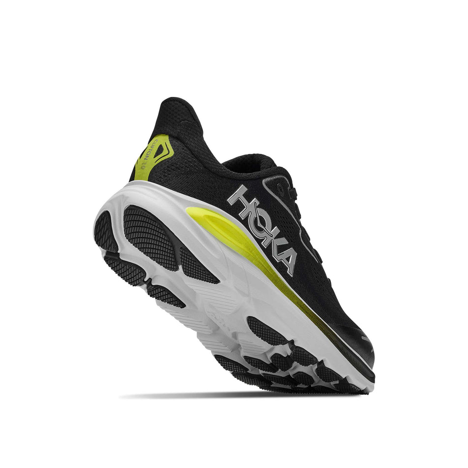 Lateral - and outsole - view of the right shoe from a pair of HOKA Clifton 10 Big Kids Running Shoes in the Black/Cosmic Grey colourway.