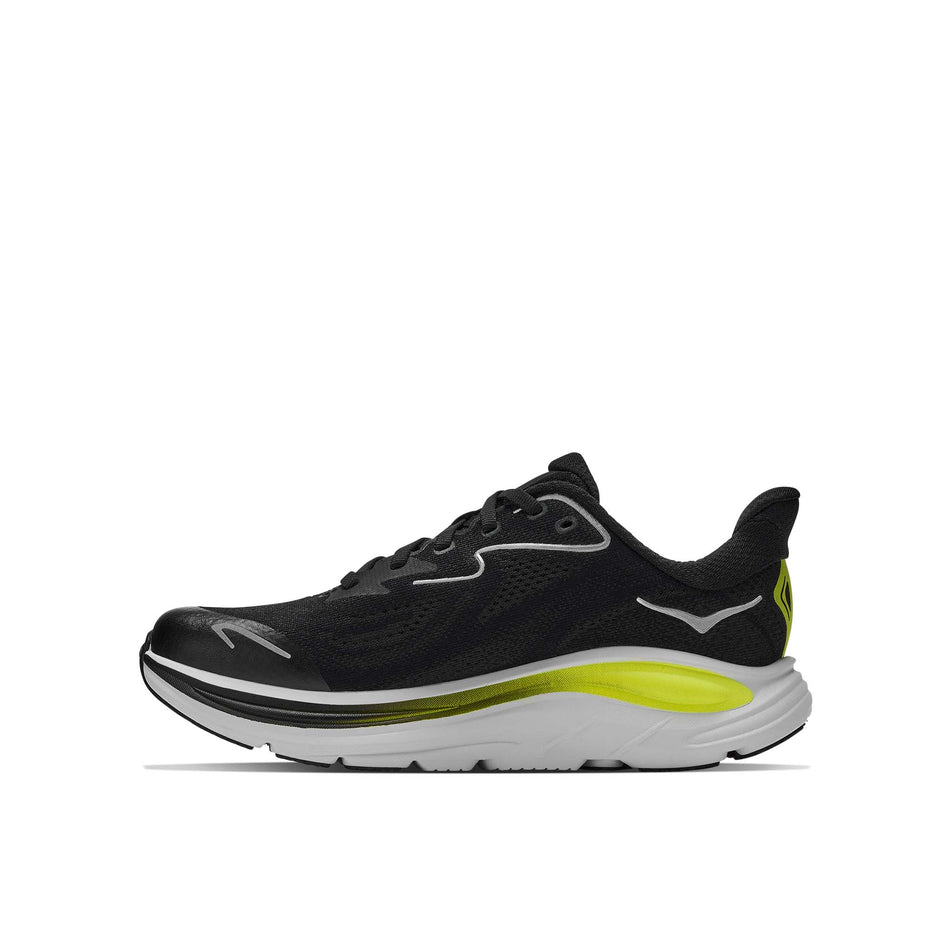 Medial view of the right shoe from a pair of HOKA Clifton 10 Big Kids Running Shoes in the Black/Cosmic Grey colourway.