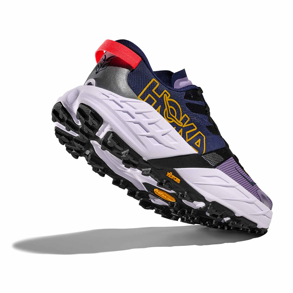 Lateral - and outsole - view of the right shoe from a pair of HOKA Women's Speedgoat 7 Running Shoes in the Berry Jam/Starlight Glow colourway.