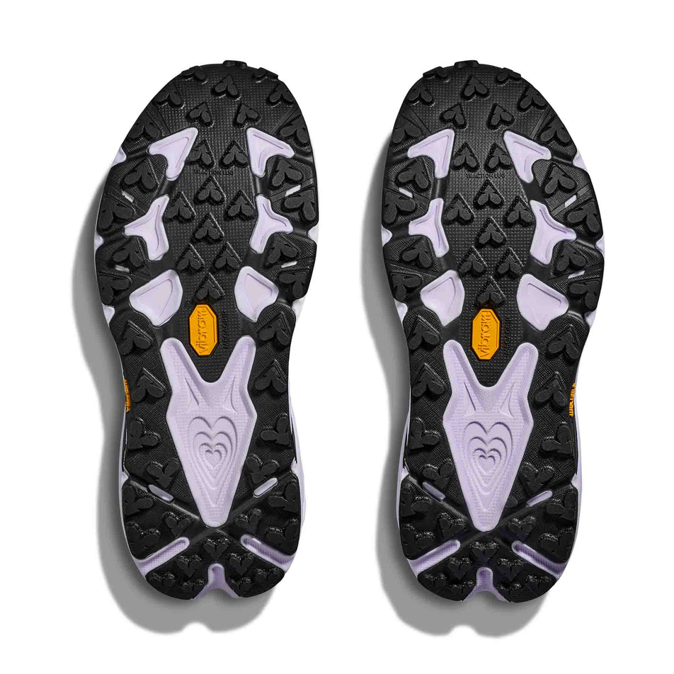 The outsoles of a pair of HOKA Women's Speedgoat 7 Running Shoes in the Berry Jam/Starlight Glow colourway.