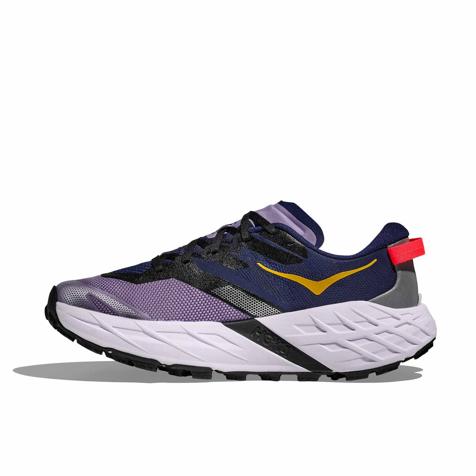Medial view of the right shoe from a pair of HOKA Women's Speedgoat 7 Running Shoes in the Berry Jam/Starlight Glow colourway.