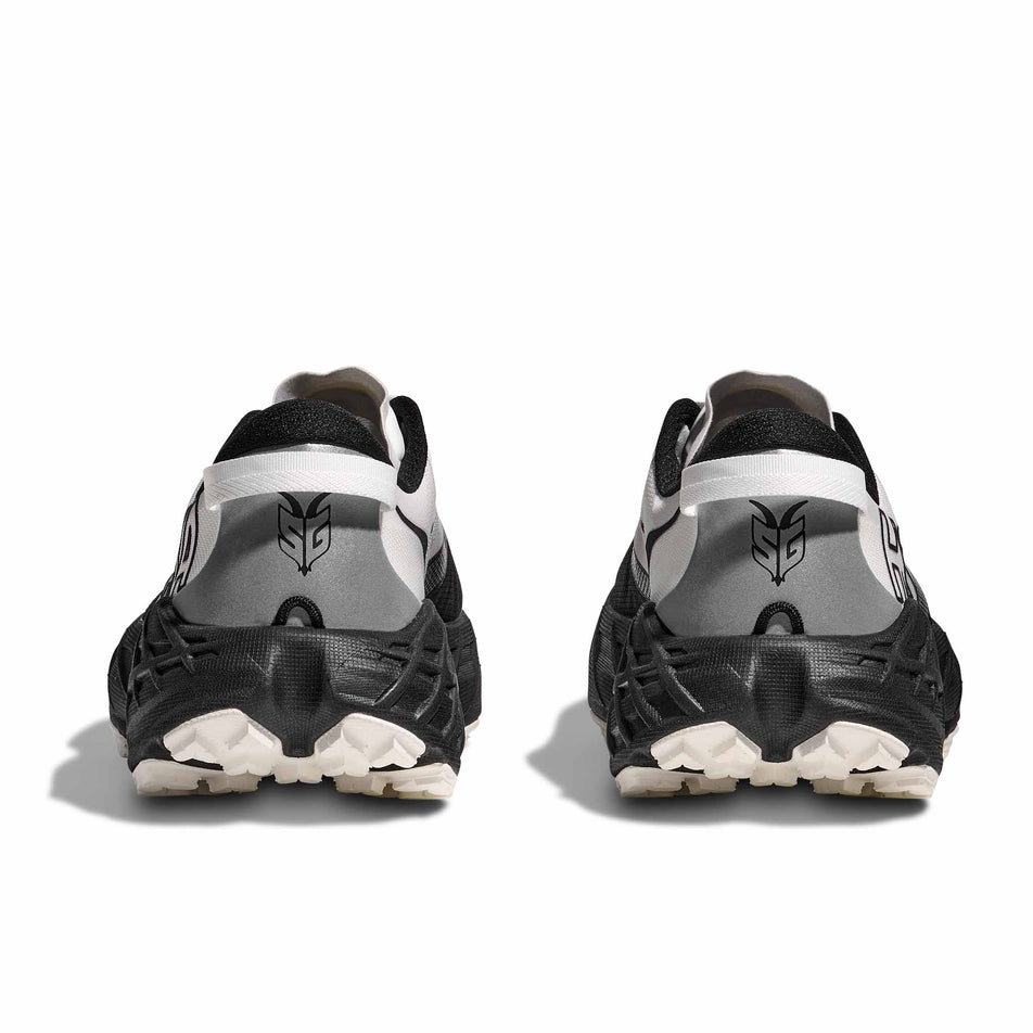 The back of a pair of HOKA Women's Speedgoat 7 Running Shoes in the Black/White colourway.