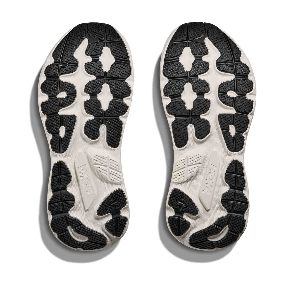 The outsoles of a pair of HOKA Men's Gaviota 6 Running Shoes in the Sage/Stardust colourway.