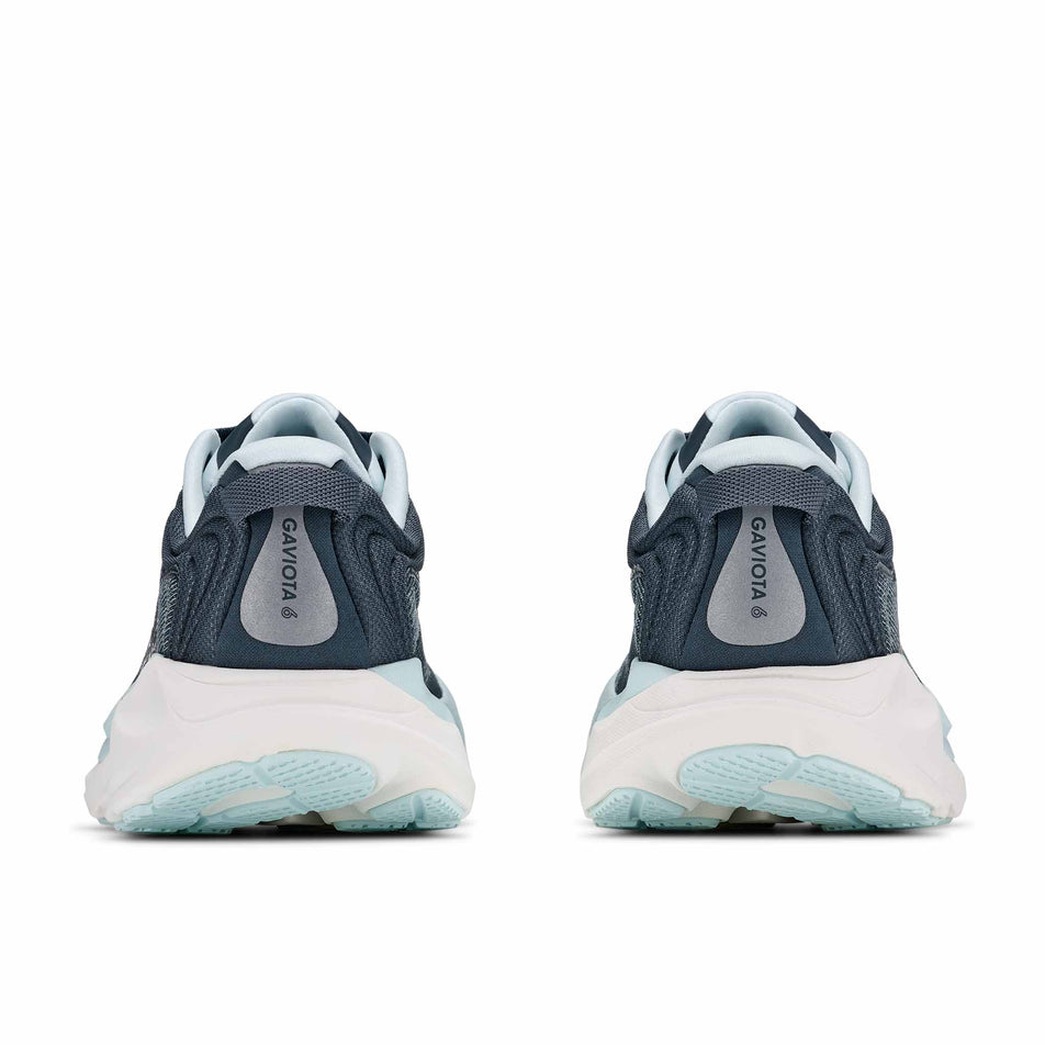 The back of a pair of HOKA Women's Gaviota 6 Running Shoes in the Faded Navy/Glimmering Blue colourway.