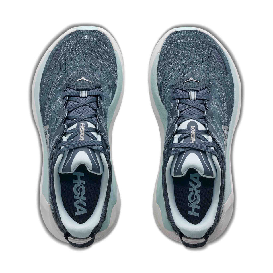 The uppers of a pair of HOKA Women's Gaviota 6 Running Shoes in the Faded Navy/Glimmering Blue colourway.