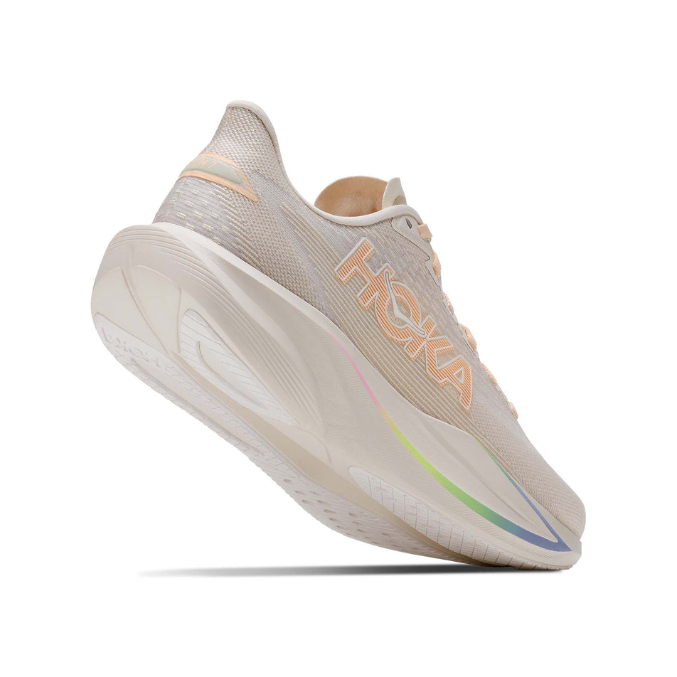 Lateral - and outsole - view of the right shoe from a pair of HOKA Women's Mach 7 Running Shoes in the Oat Milk/Alabaster colourway. 