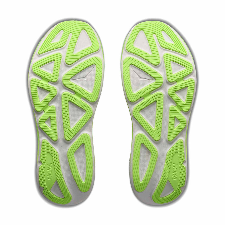 The outsoles of a pair of HOKA Men's Clifton Pro Running Shoes in the Carbon Black/Tart Apple colourway.