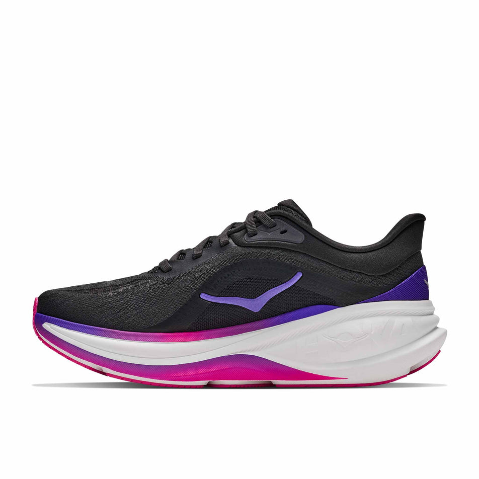 Medial view of the right shoe from a pair of HOKA Women's Clifton Pro Running Shoes in the Carbon Black/Cosmic Purple colourway.