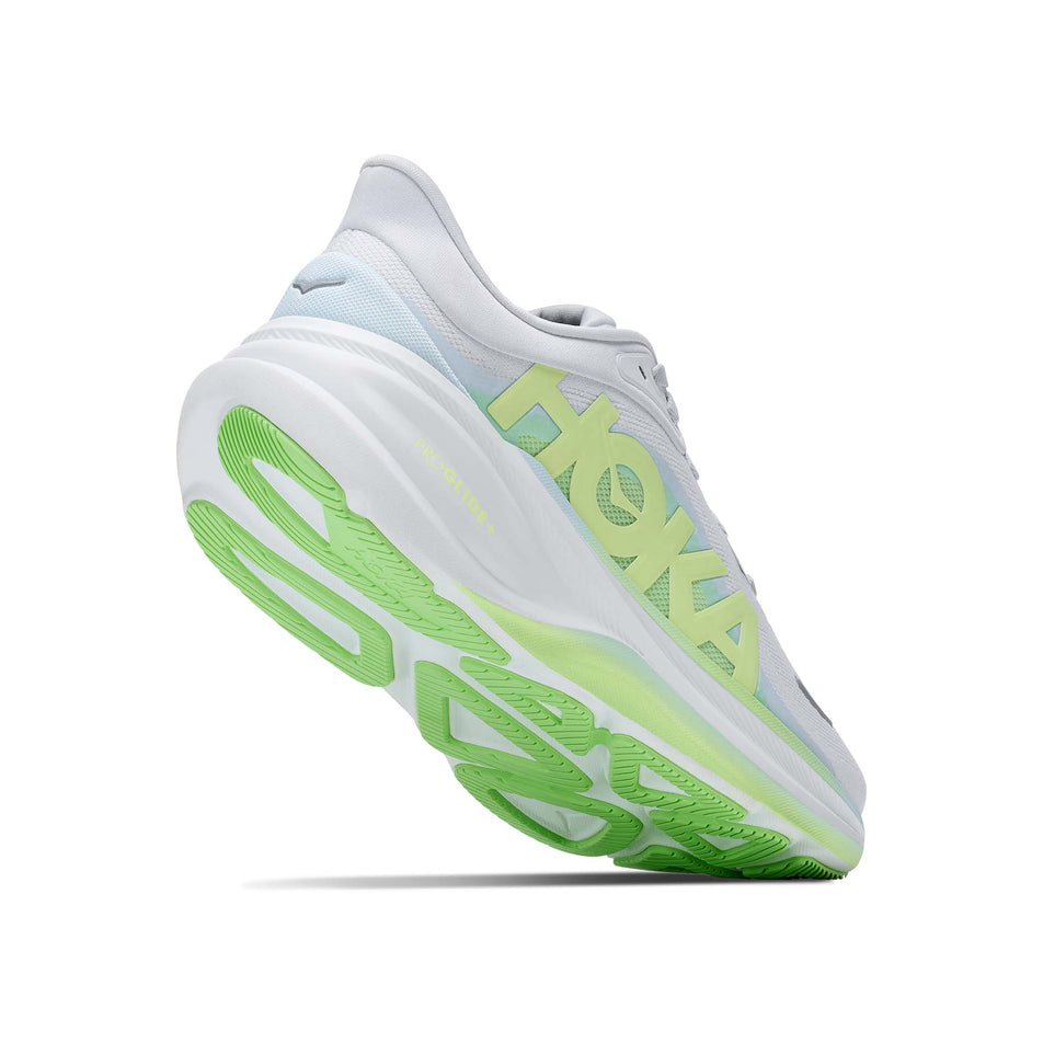 Lateral - and outsole - view of the right shoe from a pair of HOKA Women's Clifton Pro Running Shoes in the Cosmic Grey/Neon Yuzu colourway.