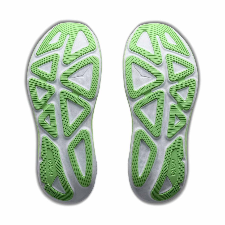 The outsoles of a pair of HOKA Women's Clifton Pro Running Shoes in the Cosmic Grey/Neon Yuzu colourway.