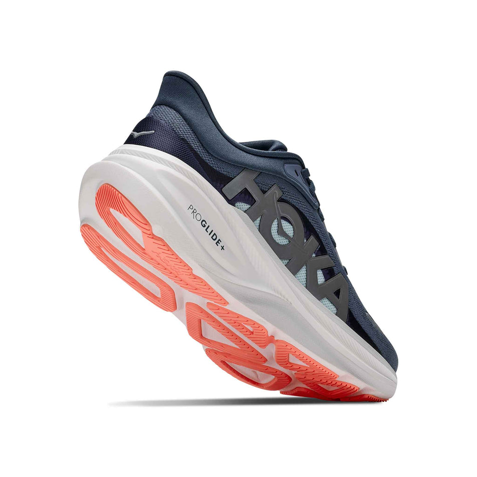 Lateral - and outsole - view of the right shoe from a pair of HOKA Women's Clifton Pro Running Shoes in the Faded Navy/Glimmering Blue colourway.
