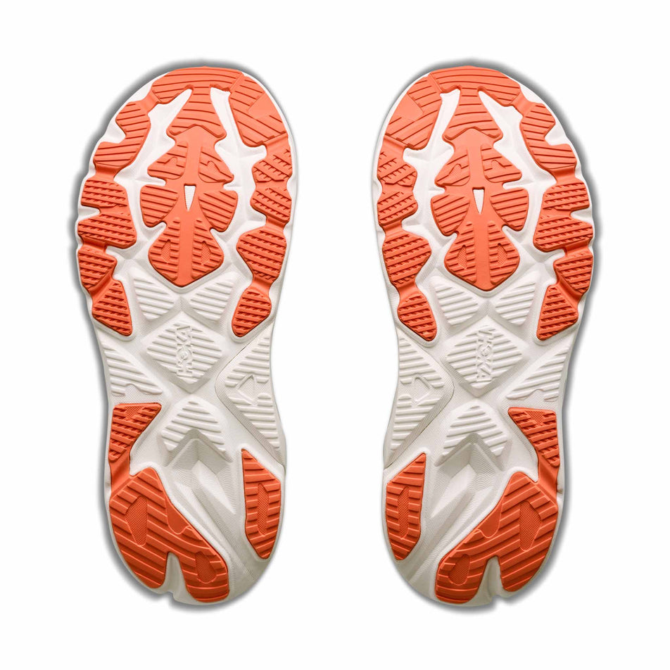 The outsoles of a pair of HOKA Women's Arahi 9 Running Shoes in the Varsity Navy/Faded Navy colourway.