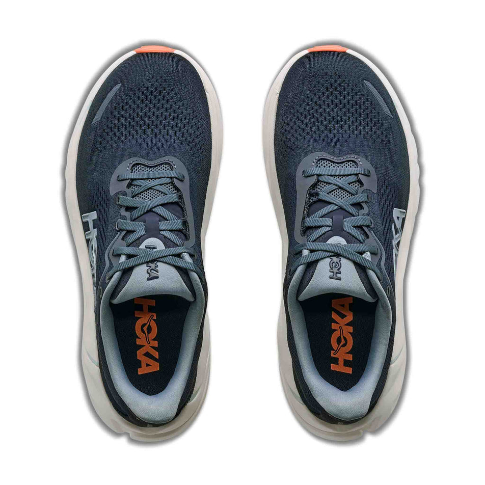 The uppers of a pair of HOKA Women's Arahi 9 Running Shoes in the Varsity Navy/Faded Navy colourway.