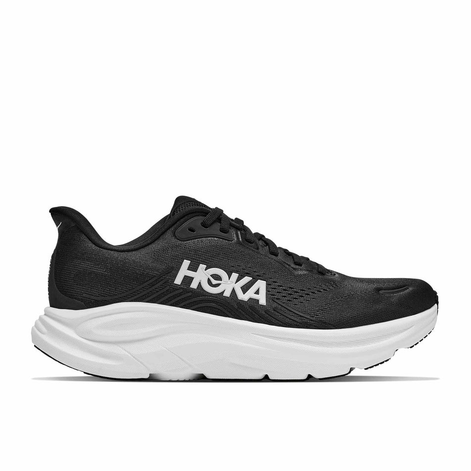 Lateral view of the right shoe from a pair of HOKA Women's Clifton 11 Running Shoes in the Black/White colourway.