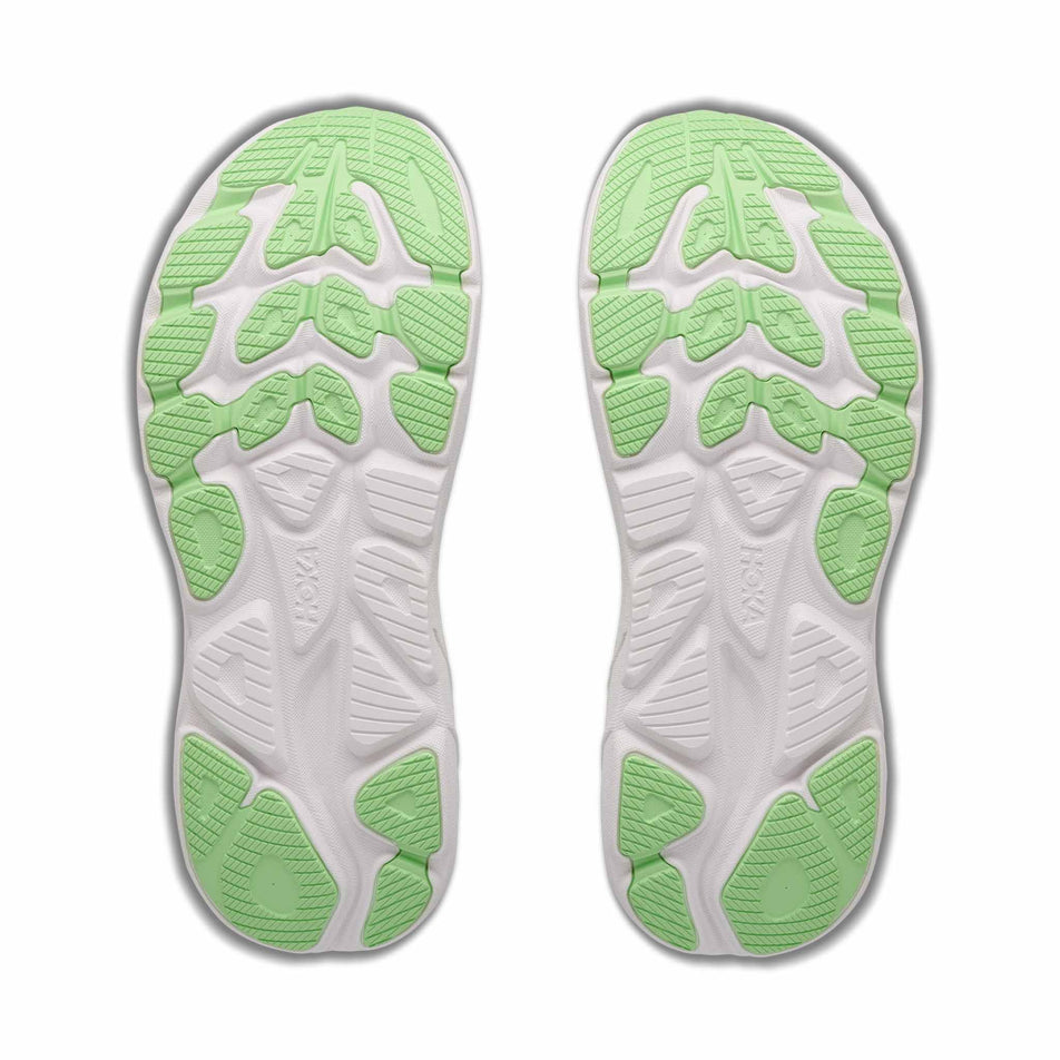 The outsoles of a pair of HOKA Women's Clifton 11 Running Shoes in the Frost/Neon Yuzu colourway.