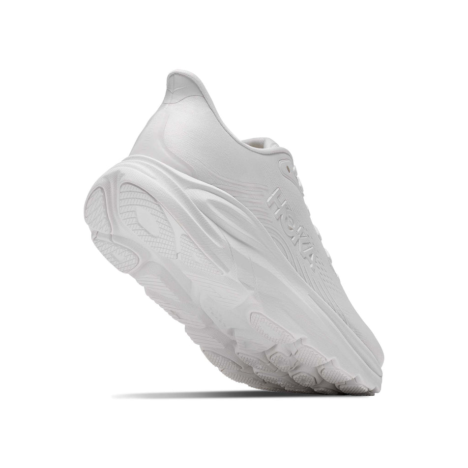 Lateral - and outsole - view of the right shoe from a pair of HOKA Women's Clifton 11 Running Shoes in the White/White colourway.