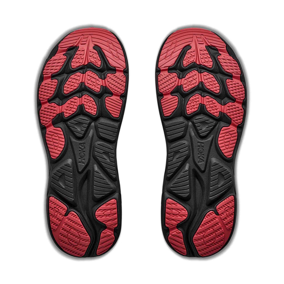 The outsoles of a pair of HOKA Men's Clifton 11 GTX Running Shoes in the River Rock Grey/Carbon Black colourway.