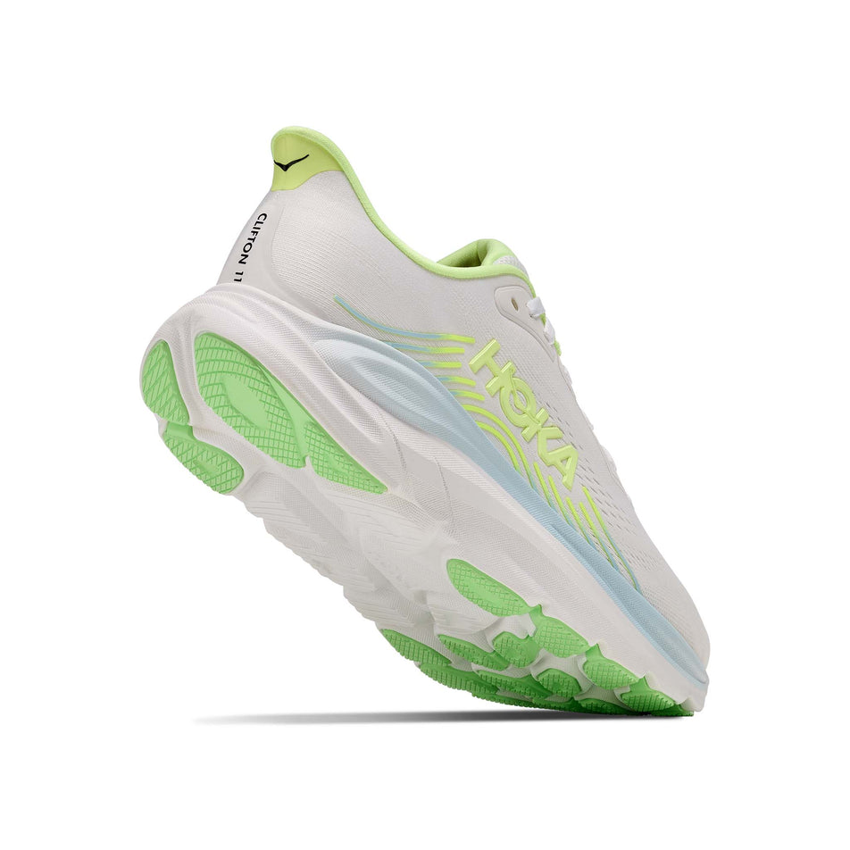 Lateral - and outsole - view of the right shoe from a pair of HOKA Women's Clifton 11 Wide Running Shoes in the Frost/Neon Yuzu colourway.