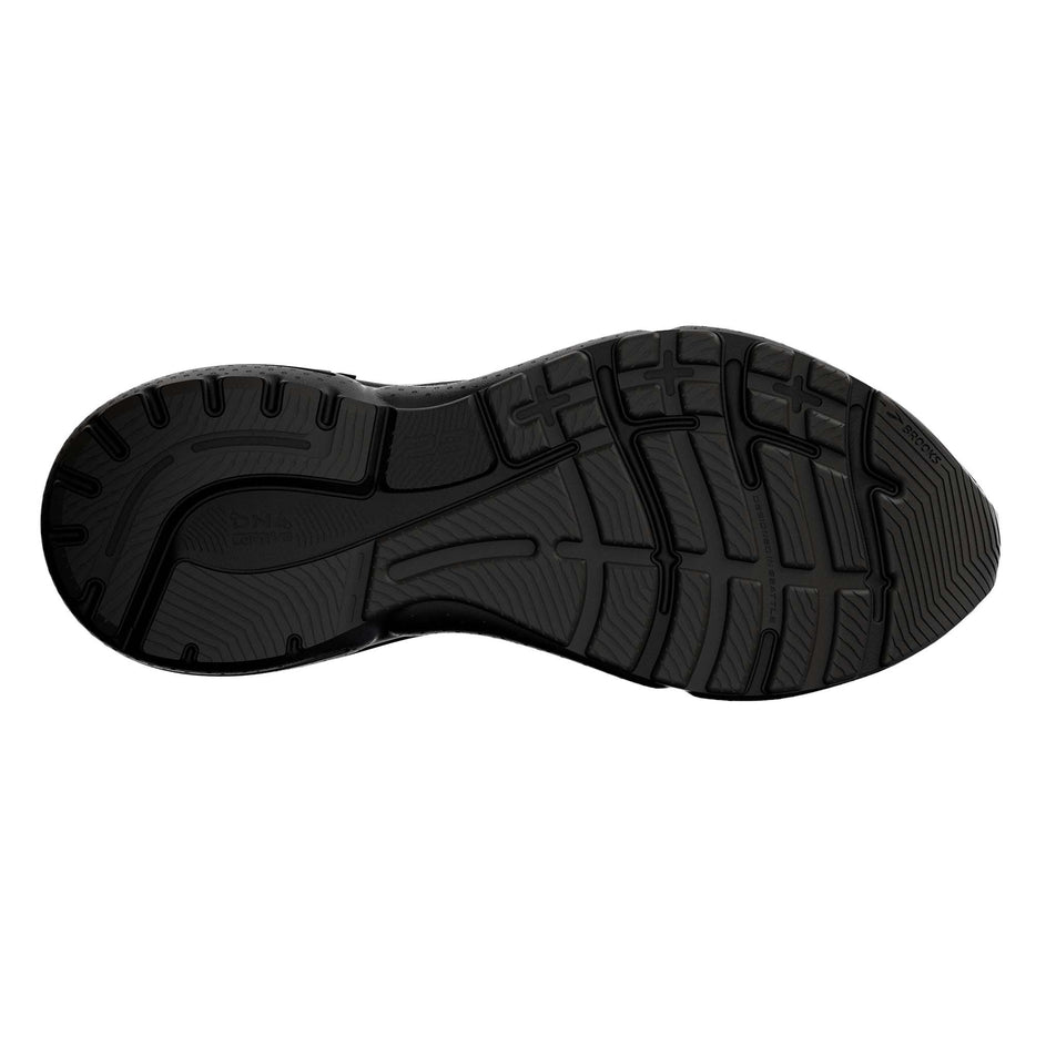 The outsole of the right shoe from a pair of Brooks Women's Adrenaline GTS 23 Running Shoes in the Black/Black/Ebony colourway  (7904423018658)