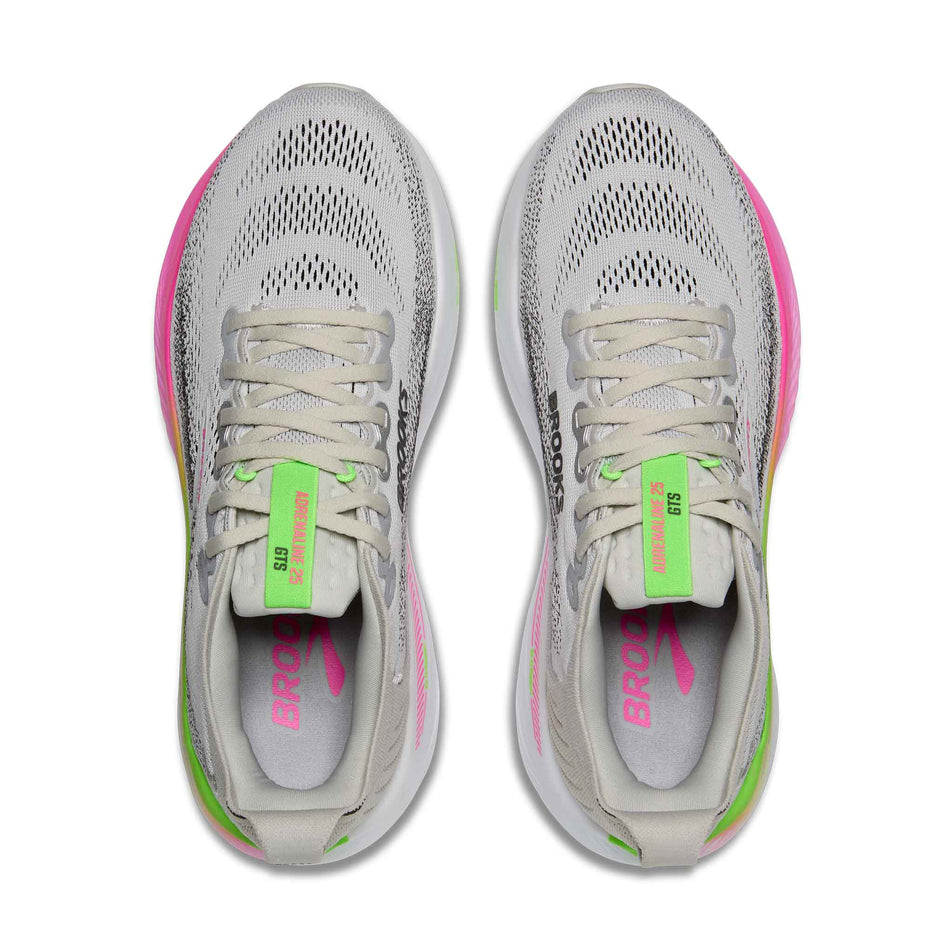 The uppers of a pair of Brooks Women's Adrenaline GTS 25 1D Running Shoes in the Oyster/Pink/Green colourway.