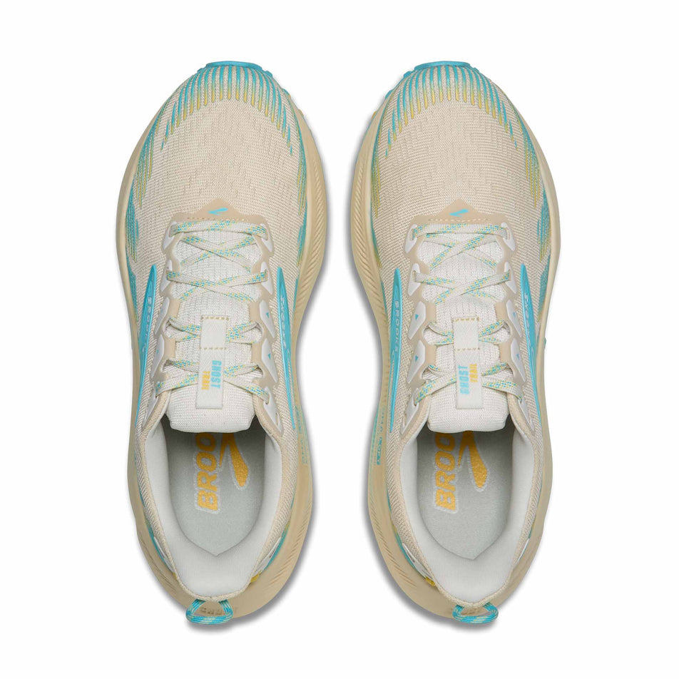 The uppers of a pair of Brooks Women's Ghost Trail Running Shoes in the Sand/Star White/Golden Hour colourway.