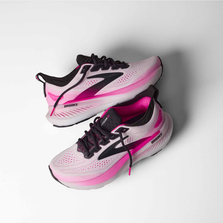 A pair of Brooks Women's Glycerin 23 Running Shoes in the White/Phantom/Cyber Pink colourway.