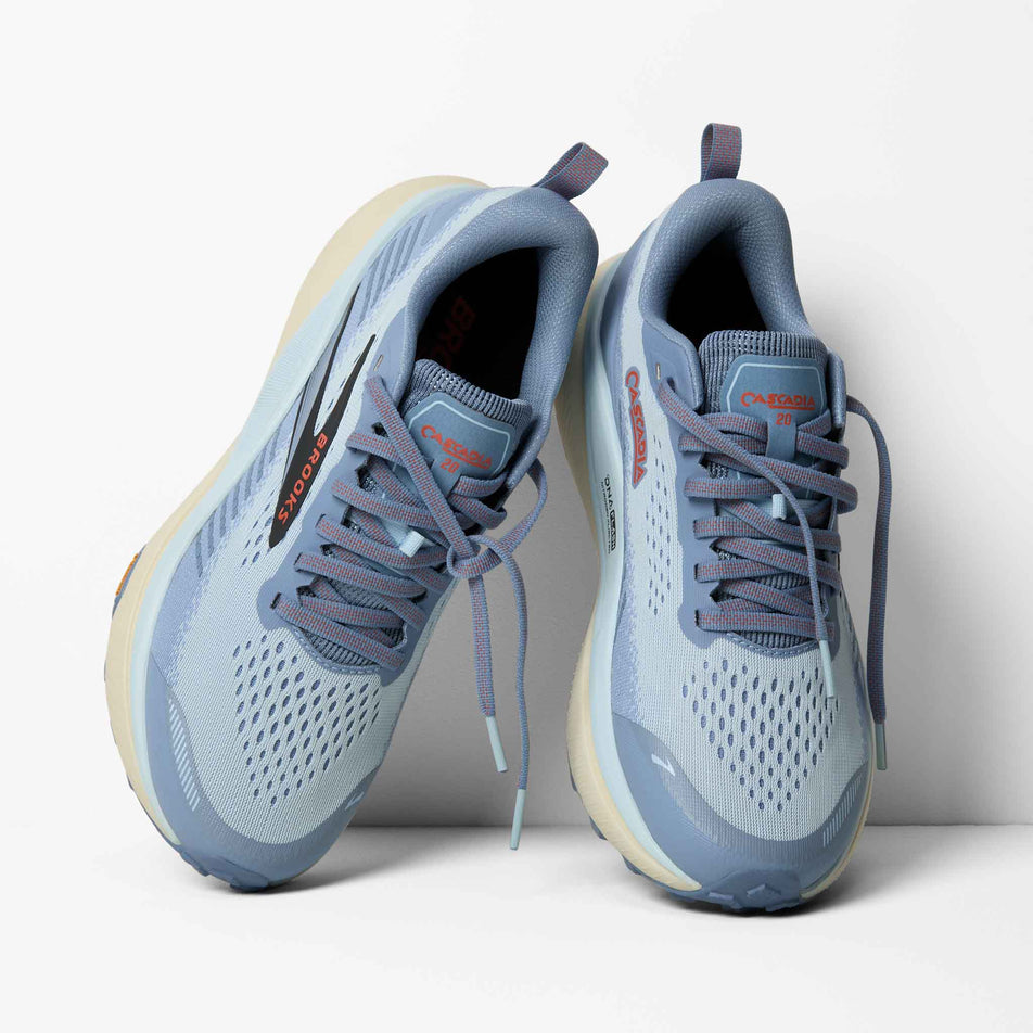 A pair of Brooks Women's Cascadia 20 Running Shoes in the  Nantucket/Blue/Tigerlily colourway.