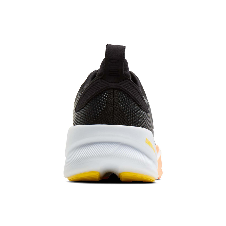 The back of the right shoe from a pair of Brooks Women's Ghost Max 4 Running Shoes in the Black/Folkstone/Cyber Peach colourway.