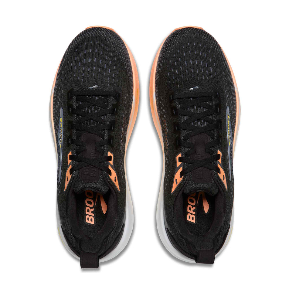 The uppers of a pair of Brooks Women's Ghost Max 4 Running Shoes in the Black/Folkstone/Cyber Peach colourway.