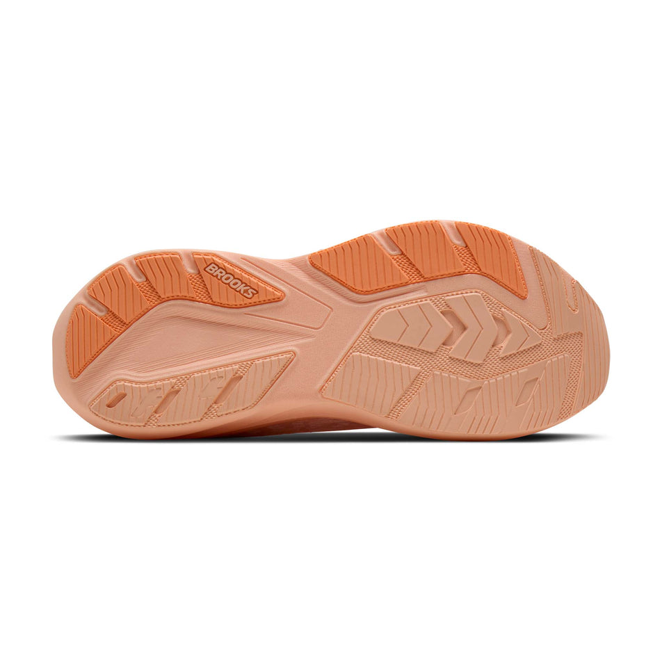 The outsole of the right shoe from a pair of Brooks Women's Ghost AMP Running Shoes in the Peach/Peach/White colourway.