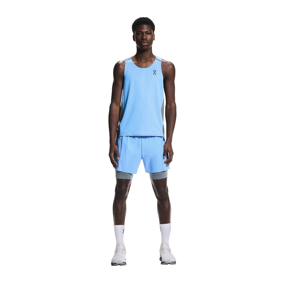 Front view of a model wearing the On Men's Performance Tank in the Gourami/Rock colourway.