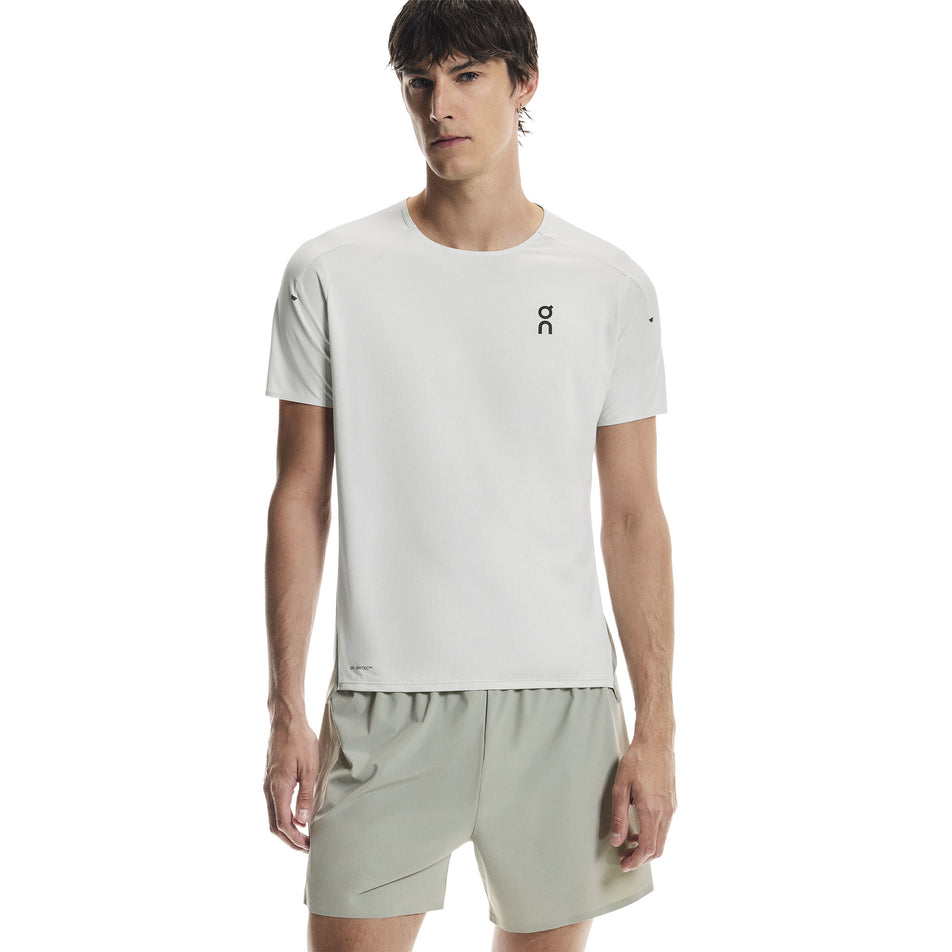 Front view of a model wearing the On Men's Performance-T in the Iceberg/Tin colourway.
