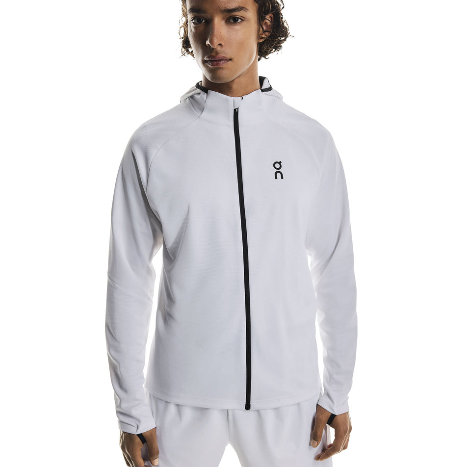Front view of a model wearing the On Men's Climate Zip Hoodie in the White colourway.