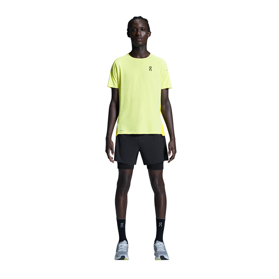Back view of a model wearing the On Men's 5
