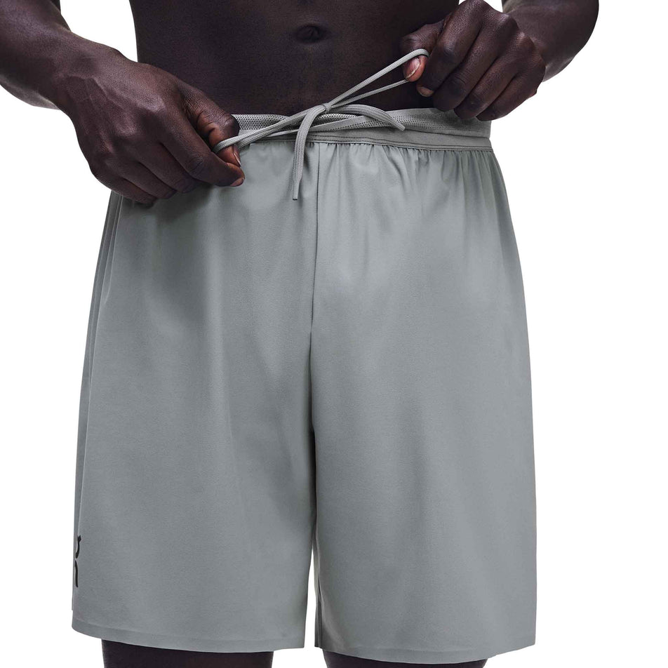 Front view of a model wearing the On Men's 7