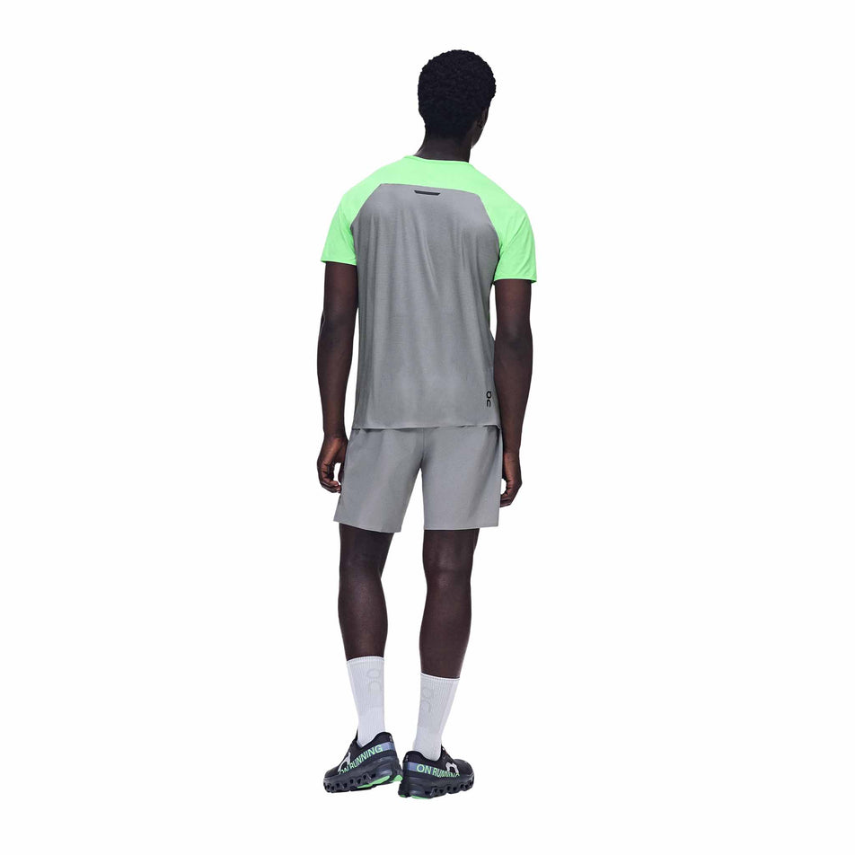 Back view of a model wearing the On Men's 7