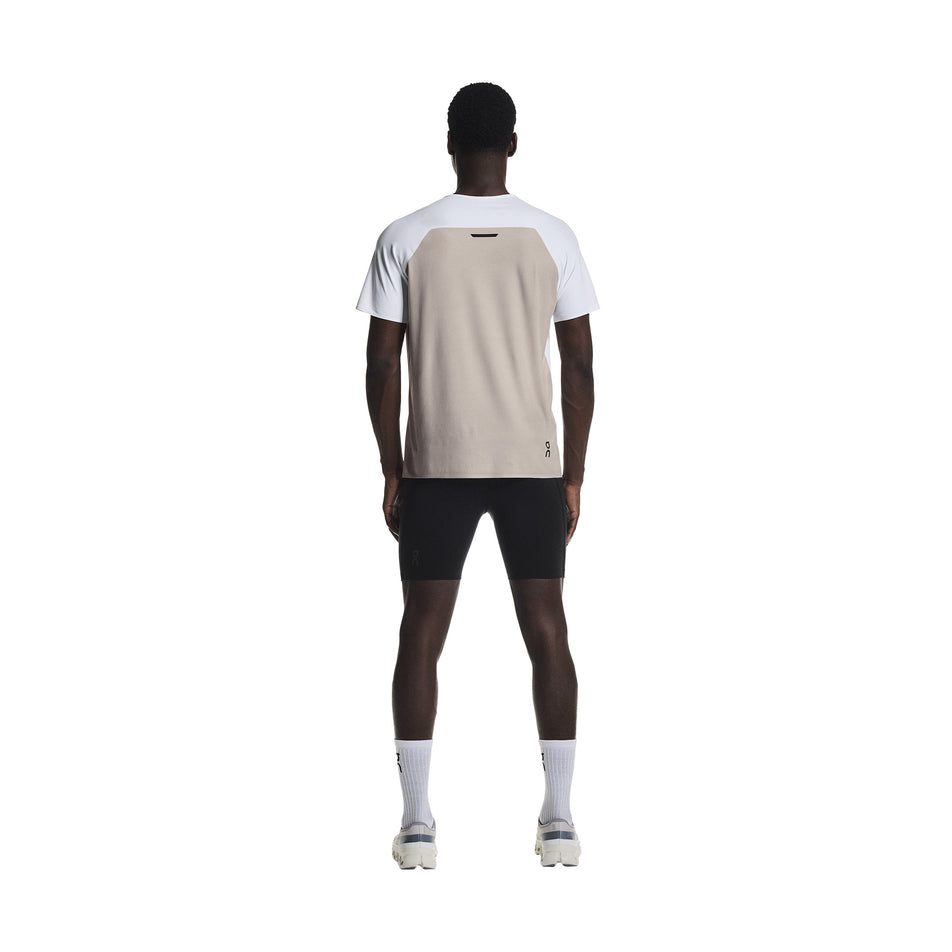 Back view of a model wearing the On Men's 8