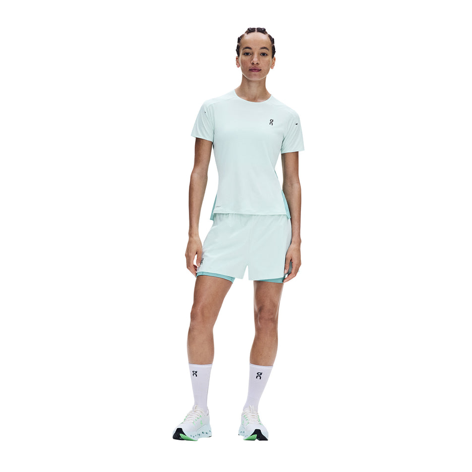 Front view of a model wearing the On Women's Performance-T in the Flurry/Aquamarine colourway.
