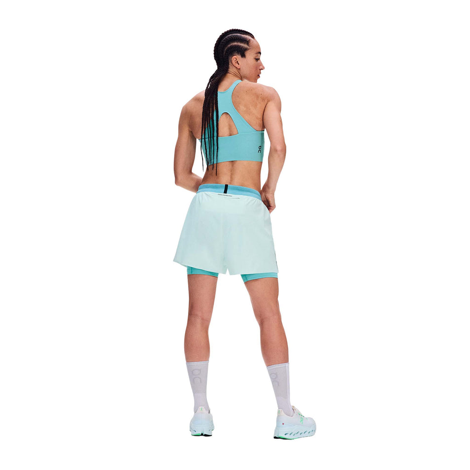 Back view of a model wearing the On Women's 3