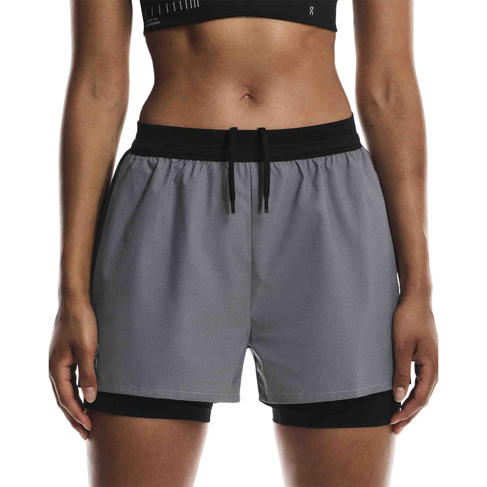 Front view of a model wearing the On Women's Performance Shorts Lumos in the Eclipse/Black colourway. (8790051815586)