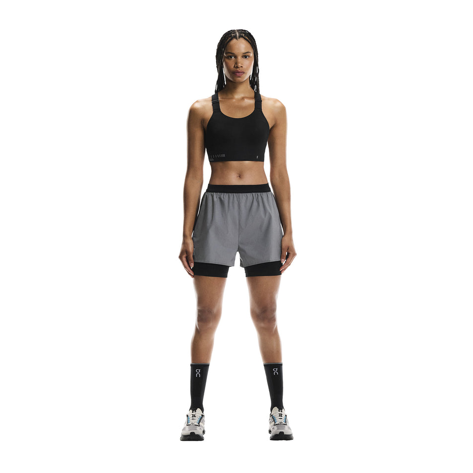 Front view of a model wearing the On Women's Performance Shorts Lumos in the Eclipse/Black colourway. (8790051815586)