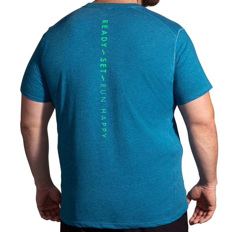 Back view of a model wearing a Brooks Men's Distance Short Sleeve 2.0 Running T-shirt in the Heather Dark Ocean/Ready Set Run Happy colourway (8007464091810)