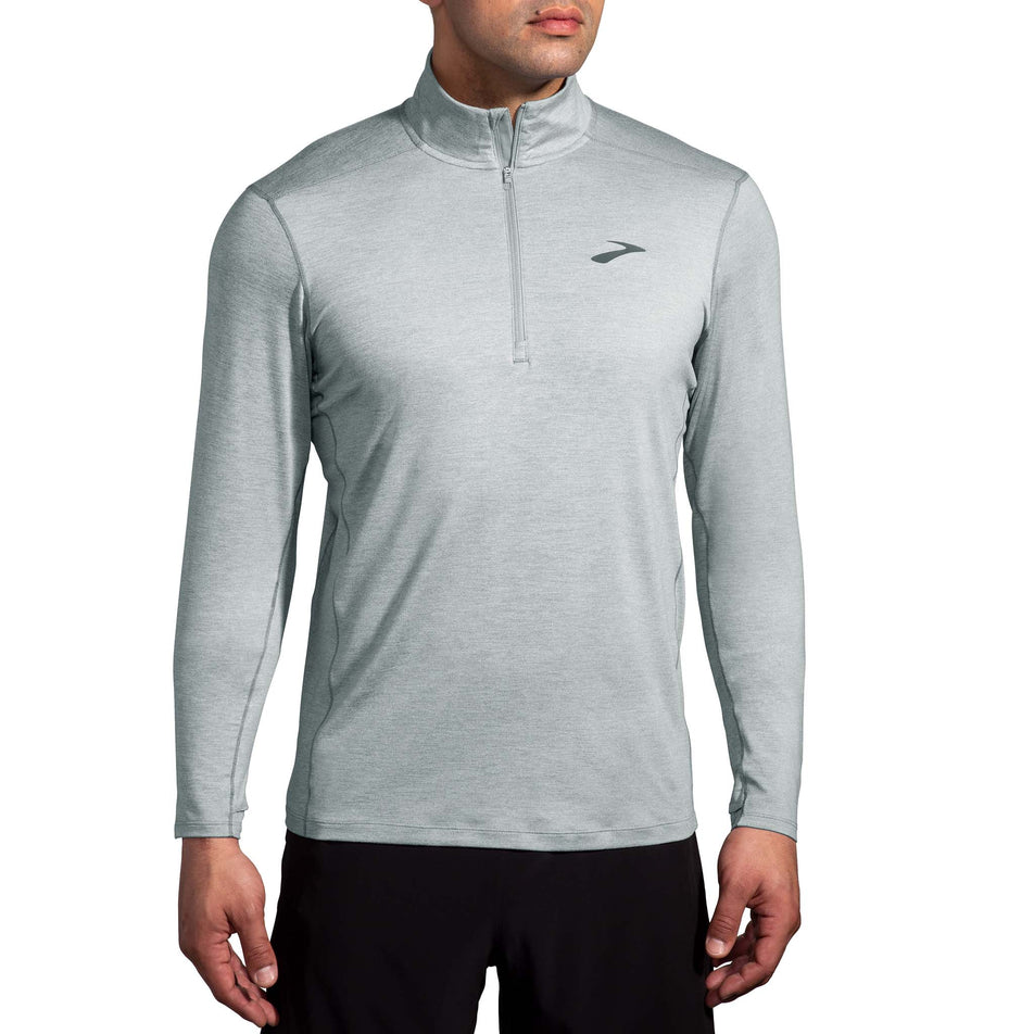 Front view of a model wearing a Brooks Men's Dash 1/2 Zip 2.0 in the Heather Stone colourway. (8177451729058)