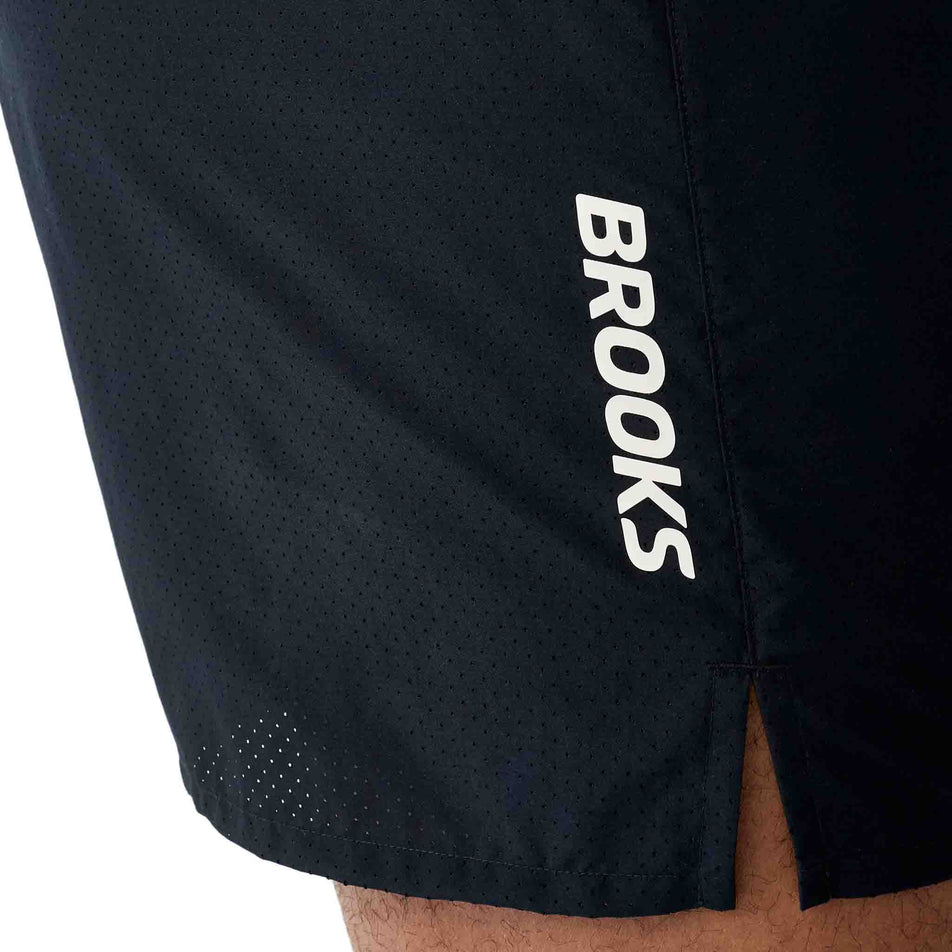 The Brooks logon on the Brooks Men's Dash Cooling Short in the Black colourway.