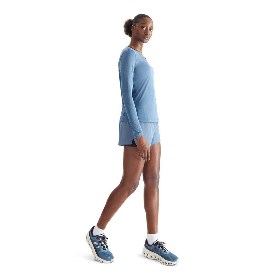Side view of a model wearing an On Women's Performance Long-T in the Stellar colourway (8003477209250)