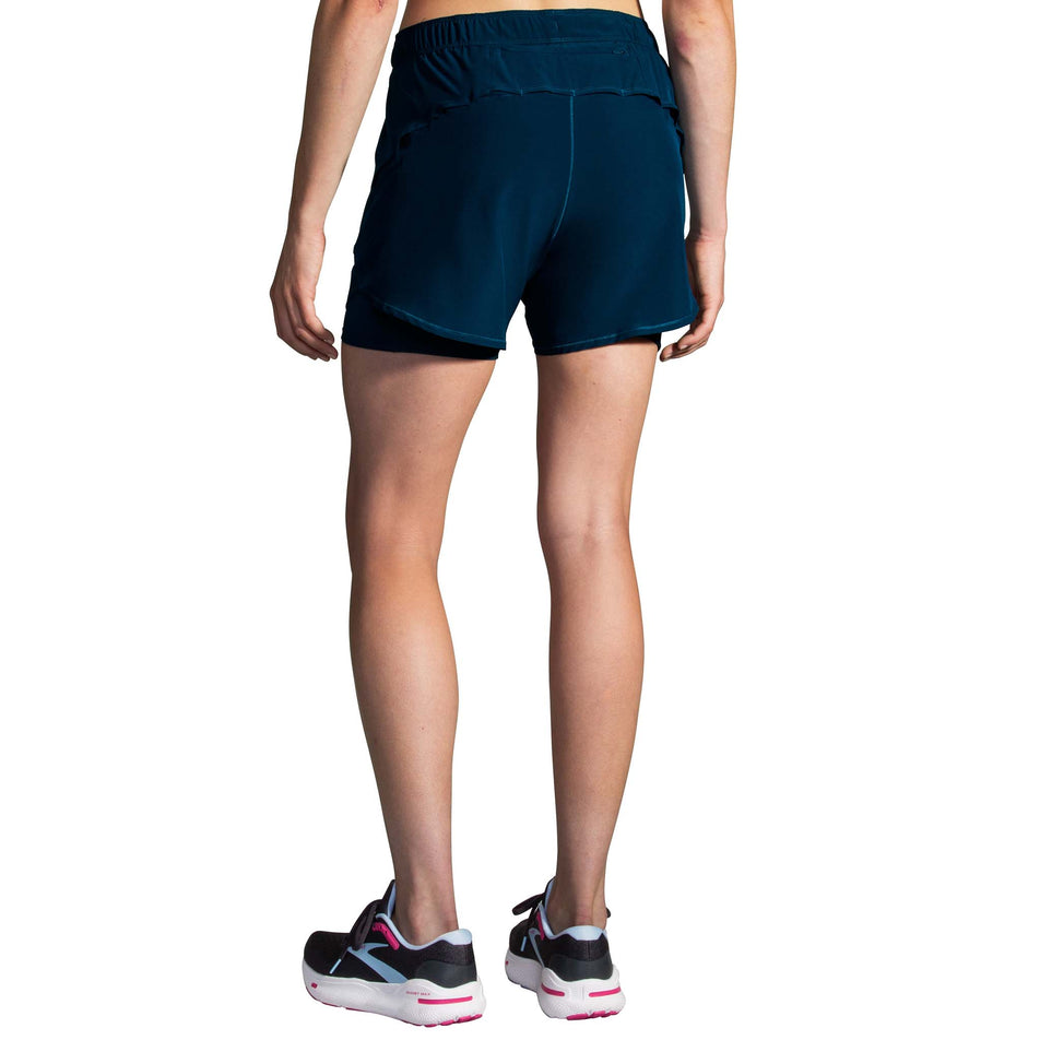 Back view of a model wearing the Brooks Women's Chaser 5