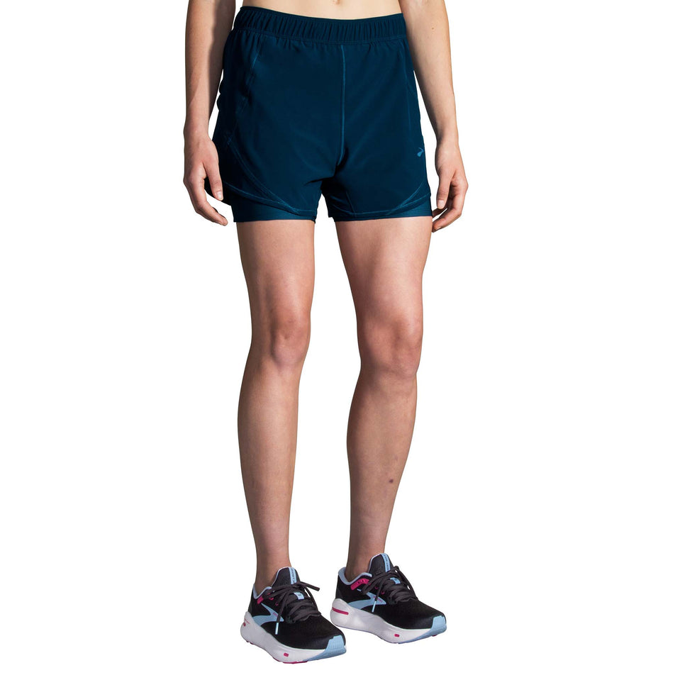 Front view of a model wearing the Brooks Women's Chaser 5