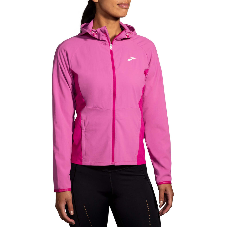 Front view of a model wearing a Brooks Women's Canopy Jacket in the Frosted Mauve/Mauve colourway (8007491748002)